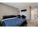 Comfortable bedroom featuring a closet and natural light from the window at 1348 Calle Montery St, Las Vegas, NV 89117