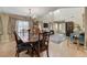 Open dining and living area filled with natural light and charming decor at 1348 Calle Montery St, Las Vegas, NV 89117