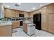Spacious kitchen with ample cabinetry and a convenient center island at 1348 Calle Montery St, Las Vegas, NV 89117
