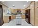 Functional kitchen featuring ample cabinetry and tile flooring at 1348 Calle Montery St, Las Vegas, NV 89117