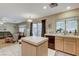 Well-lit kitchen with large windows, modern appliances, and an island that is perfect for cooking and entertaining at 1348 Calle Montery St, Las Vegas, NV 89117