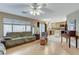 Bright living area connected to kitchen with large window and comfortable seating at 1348 Calle Montery St, Las Vegas, NV 89117