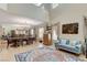Open-concept living and dining space with high ceilings, offering abundant natural light at 1348 Calle Montery St, Las Vegas, NV 89117