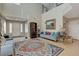 Spacious living area with high ceilings providing ample natural light, adjacent to the entryway at 1348 Calle Montery St, Las Vegas, NV 89117