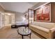 Comfortable bedroom setting features a king bed, sofa, modern lights, and a cozy atmosphere at 135 E Harmon Ave # 3215, Las Vegas, NV 89109