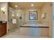 Luxurious bathroom featuring a glass shower and soaking tub at 145 E Harmon Ave # 3103, Las Vegas, NV 89109