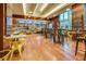 Bright cafe with tables, chairs, and large windows offering a casual dining experience at 145 E Harmon Ave # 3103, Las Vegas, NV 89109