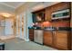 Kitchenette area with granite countertops, sink, microwave, and ample storage at 145 E Harmon Ave # 3103, Las Vegas, NV 89109
