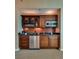 Kitchenette with granite countertops, mini fridge, microwave and stainless-steel sink at 145 E Harmon Ave # 3103, Las Vegas, NV 89109