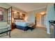Bedroom including a couch, table, work area and a bathroom in the background at 145 E Harmon Ave # 3103, Las Vegas, NV 89109