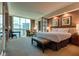 Elegant bedroom featuring floor-to-ceiling windows with expansive views at 145 E Harmon Ave # 3103, Las Vegas, NV 89109