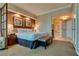 Comfortable and classy, a bedroom with an attached bathroom and a sitting space at 145 E Harmon Ave # 3103, Las Vegas, NV 89109