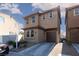 Two-story home featuring a private garage and appealing exterior at 1766 Molly Meadows St, Las Vegas, NV 89115