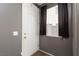 A welcoming foyer featuring a white door and neutral-toned walls at 1766 Molly Meadows St, Las Vegas, NV 89115