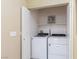 Laundry room featuring a modern washer and dryer set with shelving at 1766 Molly Meadows St, Las Vegas, NV 89115