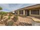 Landscaped backyard with pavers and desert landscaping is perfect for relaxation and privacy at 1779 Sebring Hills Dr, Henderson, NV 89052