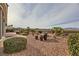 Landscaped backyard features low-maintenance desert landscape with gravel and drought-resistant plantings at 1779 Sebring Hills Dr, Henderson, NV 89052