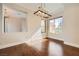 Dining room with hardwood floors and classic chandelier lighting at 1779 Sebring Hills Dr, Henderson, NV 89052