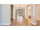 Grand foyer with soaring ceilings, stylish tile flooring and decorative double doors at 1779 Sebring Hills Dr, Henderson, NV 89052