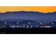 Industrial building at dusk with mountains in the background at 1779 Sebring Hills Dr, Henderson, NV 89052
