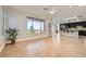 Open-concept space featuring a modern kitchen and spacious living area with tile flooring at 1779 Sebring Hills Dr, Henderson, NV 89052