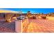 Paver patio featuring an outdoor kitchen and landscaped grounds for entertaining with lovely views at 1779 Sebring Hills Dr, Henderson, NV 89052