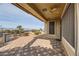Covered patio provides outdoor seating with desert landscaping and mountain views at 1779 Sebring Hills Dr, Henderson, NV 89052