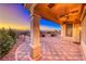 An outdoor patio with brick pavers overlooks mountain views at 1779 Sebring Hills Dr, Henderson, NV 89052