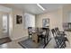 Bright dining area featuring a counter bar and access to kitchen at 1830 N Buffalo Dr # 2043, Las Vegas, NV 89128