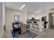 Bright dining area with a counter bar and sleek modern appliances at 1830 N Buffalo Dr # 2043, Las Vegas, NV 89128