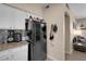 A great kitchen area with modern appliances and an eat-in bar to the living area at 1830 N Buffalo Dr # 2043, Las Vegas, NV 89128