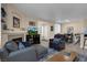 Cozy living room with tile floors, fireplace and comfortable furnishings at 1830 N Buffalo Dr # 2043, Las Vegas, NV 89128