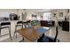 Inviting living room featuring comfortable seating, fireplace, and dining area with modern décor at 1830 N Buffalo Dr # 2043, Las Vegas, NV 89128