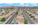 Expansive aerial view of a residential neighborhood with desert landscape and mountains in the background at 206 Red Cloud Ter, Henderson, NV 89015