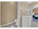Bathroom featuring a toilet and sink, with doorway access to the bedroom and shower at 206 Red Cloud Ter, Henderson, NV 89015