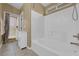 Bathroom featuring a shower and bath, and a sliding door to outside at 206 Red Cloud Ter, Henderson, NV 89015