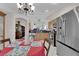 Eat-in kitchen featuring stainless steel appliances and views of the dining room at 206 Red Cloud Ter, Henderson, NV 89015