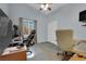 Home office with dual desk setup, modern furniture, and a large window at 206 Red Cloud Ter, Henderson, NV 89015