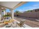 Low maintenance backyard with covered patio and desert landscaping at 2585 Shellsburg Ave, Henderson, NV 89052
