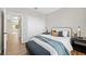 Nicely staged bedroom showcasing modern decor, bench, and ample closet space at 2585 Shellsburg Ave, Henderson, NV 89052