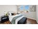 Cozy bedroom featuring a decorative bed frame, modern decor, and natural light at 2585 Shellsburg Ave, Henderson, NV 89052