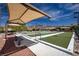 Outdoor bocce ball courts with shaded seating areas for relaxing and watching the game at 2585 Shellsburg Ave, Henderson, NV 89052