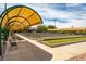 Inviting bocce ball courts with shade structures, perfect for outdoor recreation and relaxation at 2585 Shellsburg Ave, Henderson, NV 89052