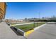 Community bocce ball court with artificial turf and covered seating at 2585 Shellsburg Ave, Henderson, NV 89052