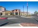 Exterior of the community clubhouse featuring manicured landscaping at 2585 Shellsburg Ave, Henderson, NV 89052