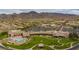 Beautiful clubhouse aerial view with meticulously landscaped grounds, a pool, and an inviting outdoor space for social gatherings at 2585 Shellsburg Ave, Henderson, NV 89052