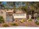 Elegant Anthem Center community sign surrounded by desert landscaping and mature trees at 2585 Shellsburg Ave, Henderson, NV 89052