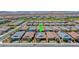 Expansive aerial view of a well-maintained neighborhood featuring modern homes and desert landscaping at 2767 Flowing Breeze St, Henderson, NV 89044
