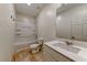 This bathroom features a shower and tub combination, as well as tile floors at 2767 Flowing Breeze St, Henderson, NV 89044