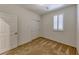 Cozy carpeted bedroom featuring shuttered window, closet with sliding doors, providing both style and functionality at 2767 Flowing Breeze St, Henderson, NV 89044